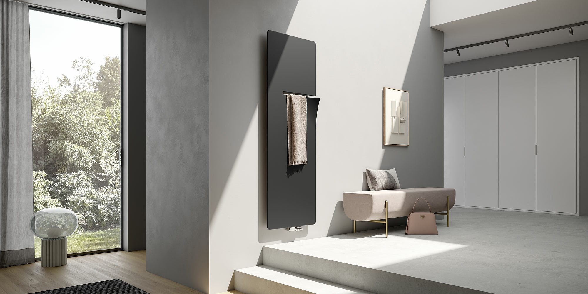 Ineo bathroom and home radiator in the left-hand version, colour Onyx in the entrance