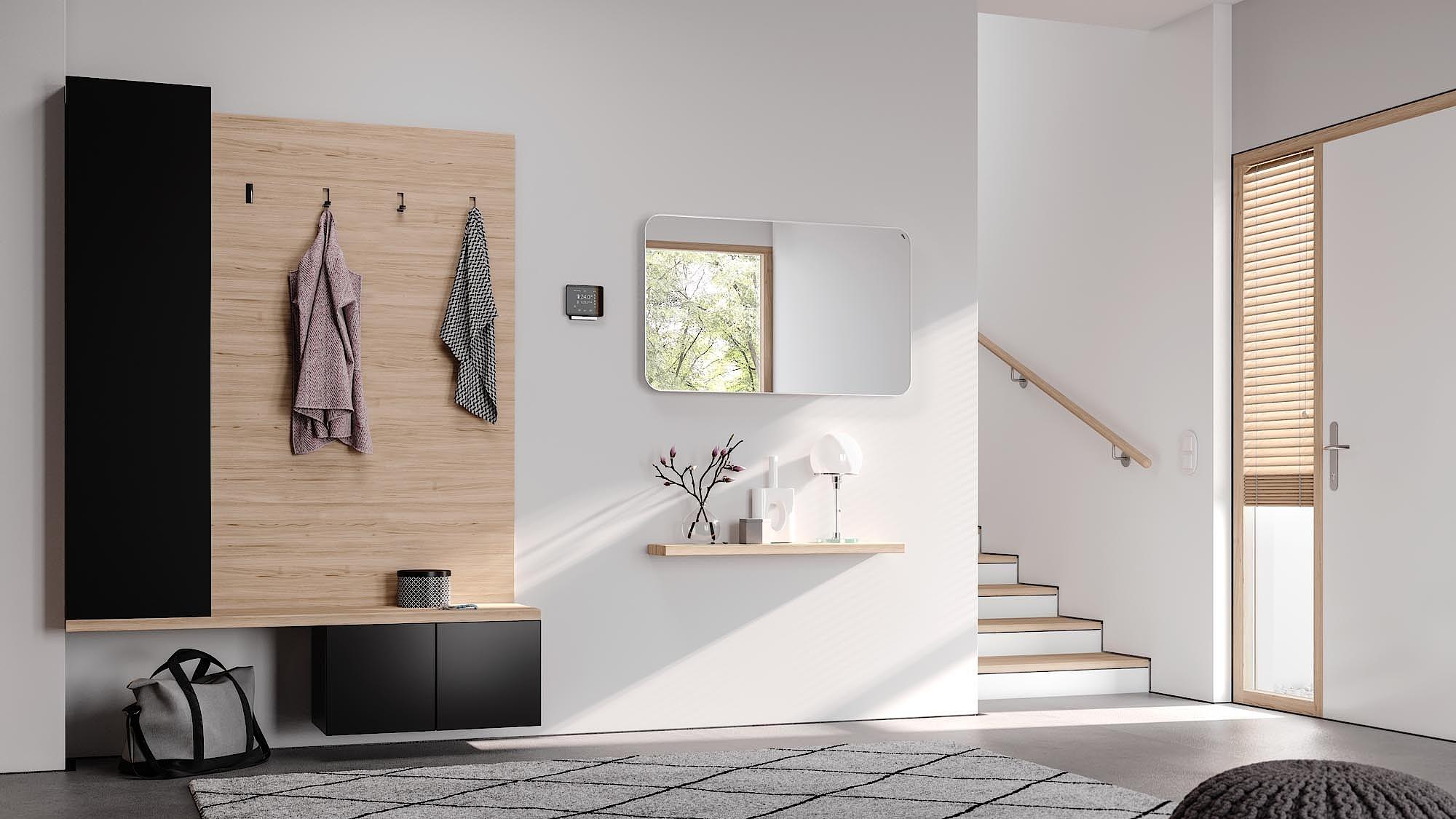 Kermi Elveo design and bathroom radiators with mirrored finish.