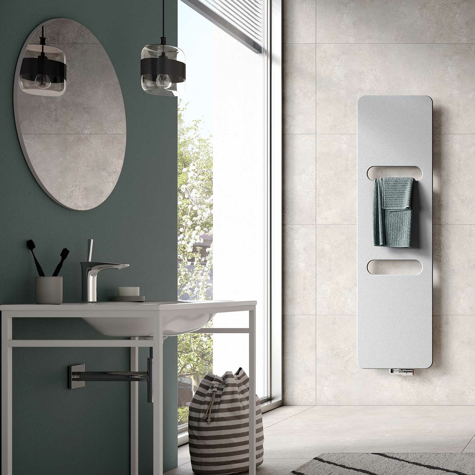 With two rounded recesses, the Fineo design and bathroom radiator from Kermi gets towels or clothes lovely and warm in no time.