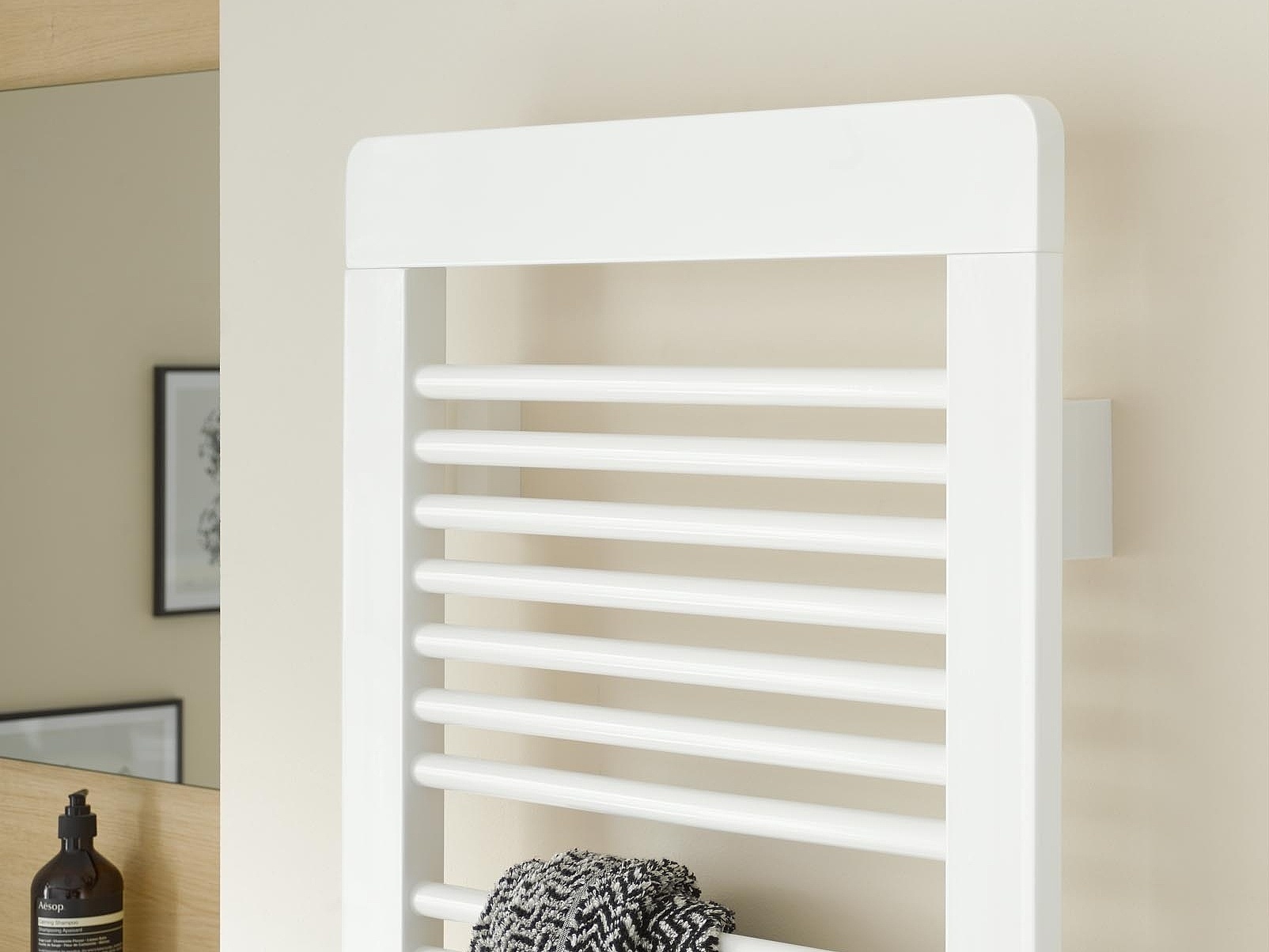 The wide spacing of the Kermi Credo plus Design and bathroom radiator is ideal for heating towels or clothing.