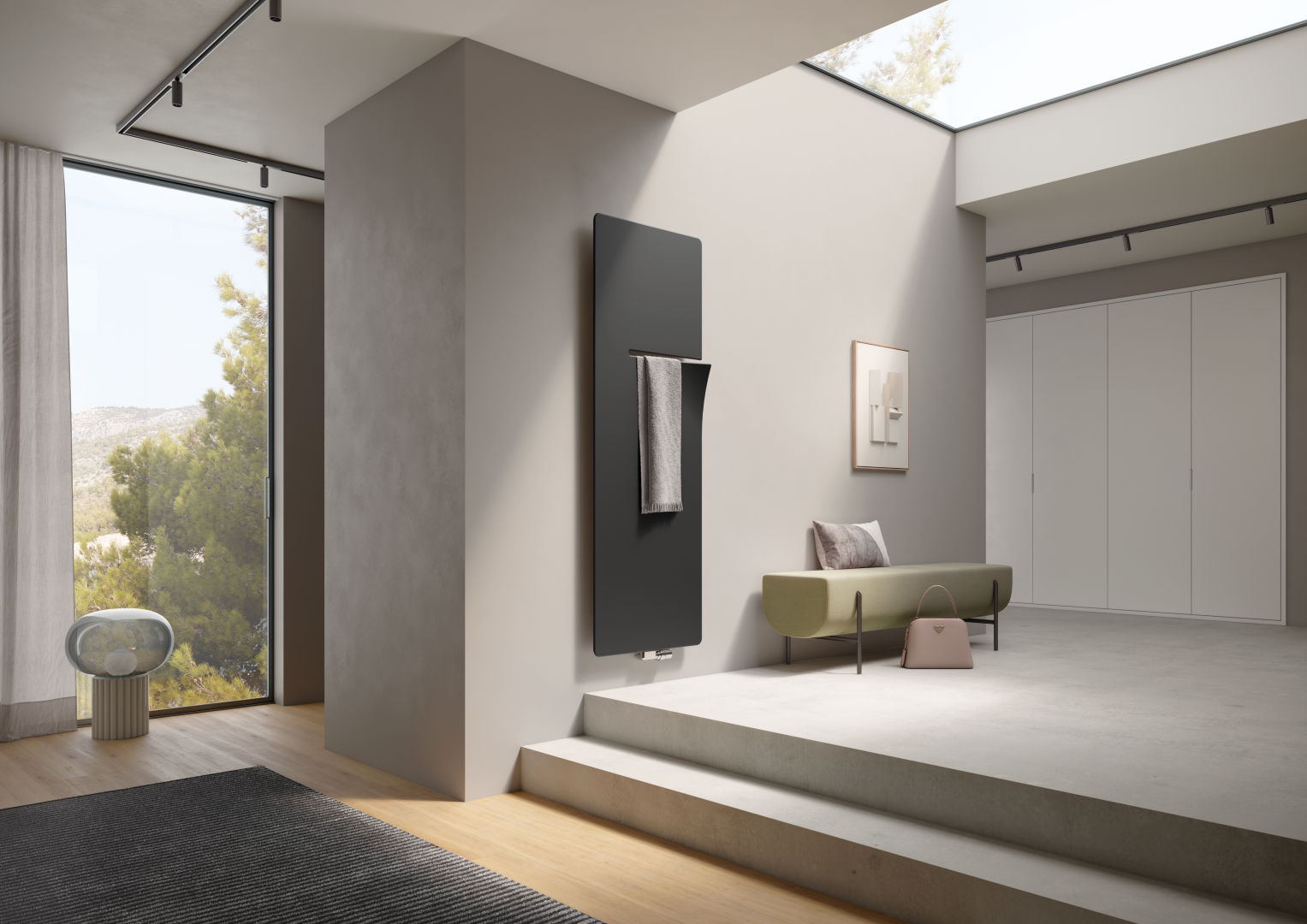 Ineo, version à gauche Radiateur de salle de bain et pièce de vie Ineo en version à gauche et en couleur onyx dans l’entrée