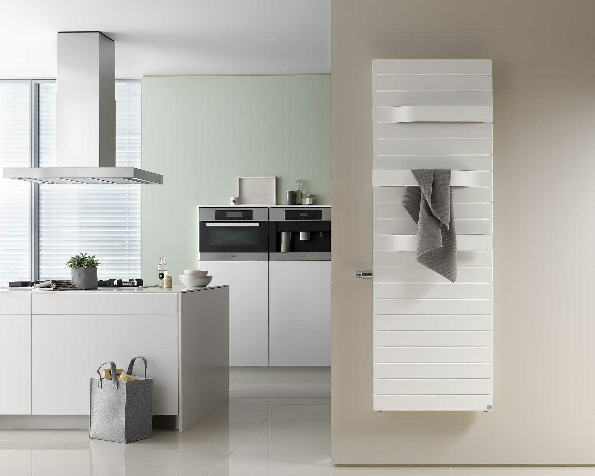 Kermi Tabeo design and bathroom radiators with clear lines and characteristic grooves.