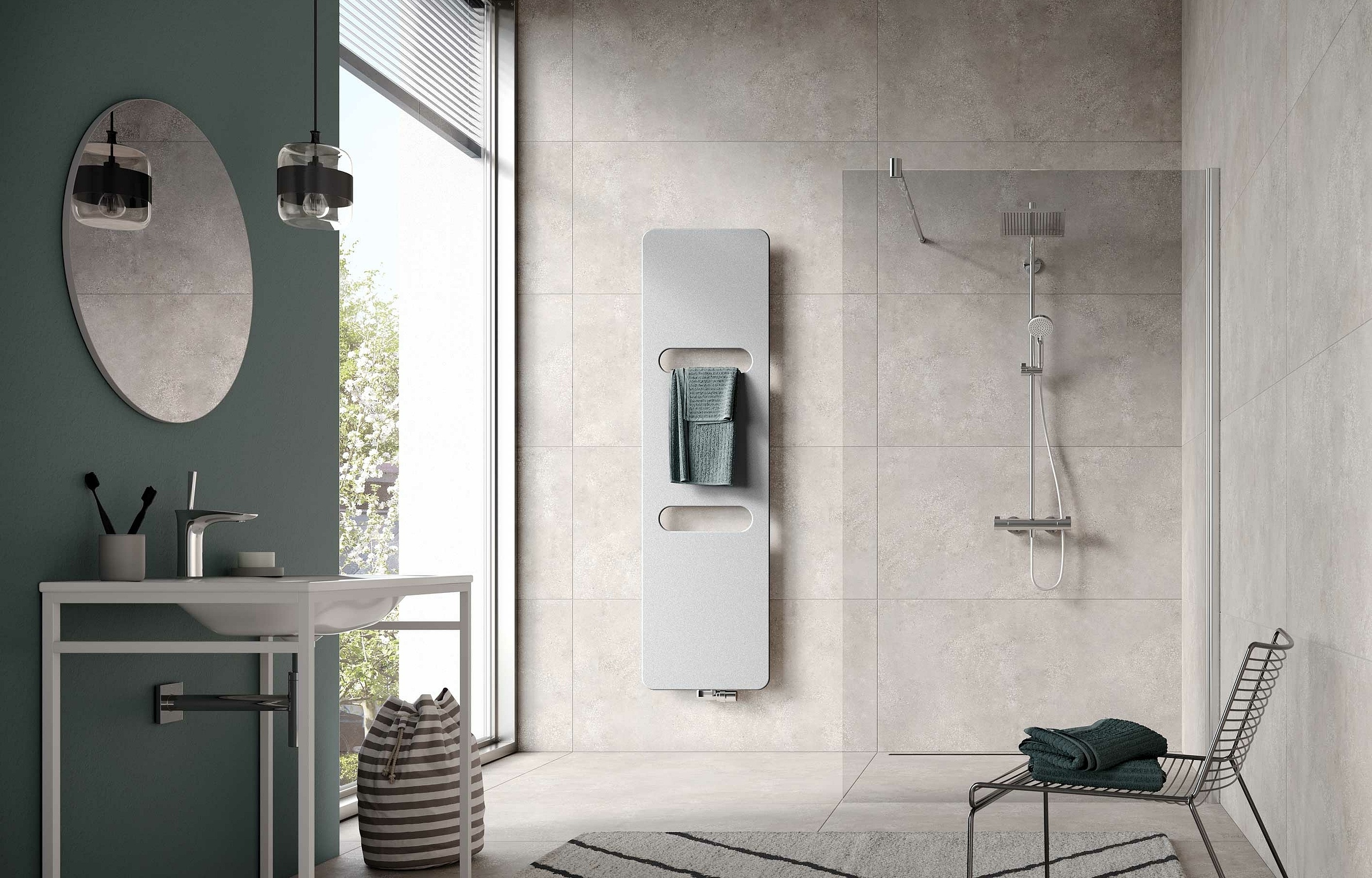 With two rounded recesses, the Fineo design and bathroom radiator from Kermi gets towels or clothes lovely and warm in no time.