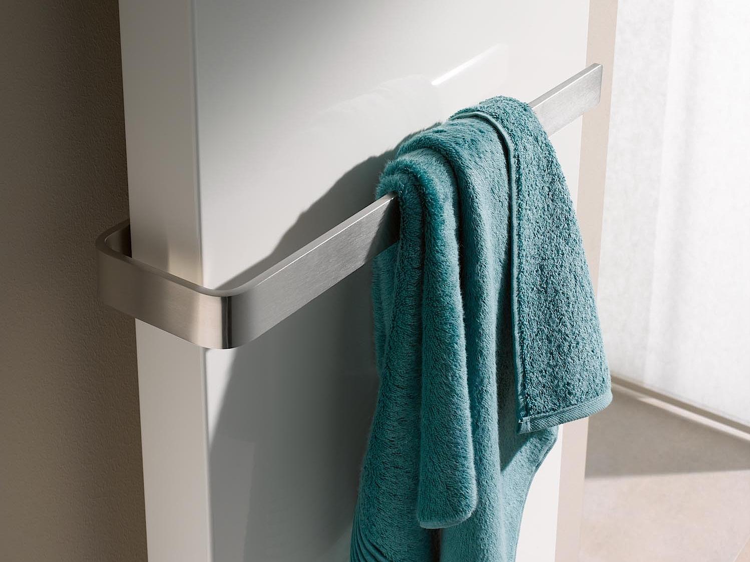 The Kermi Rubeo design and bathroom radiator allows the stainless steel towel rail to be installed at any height.